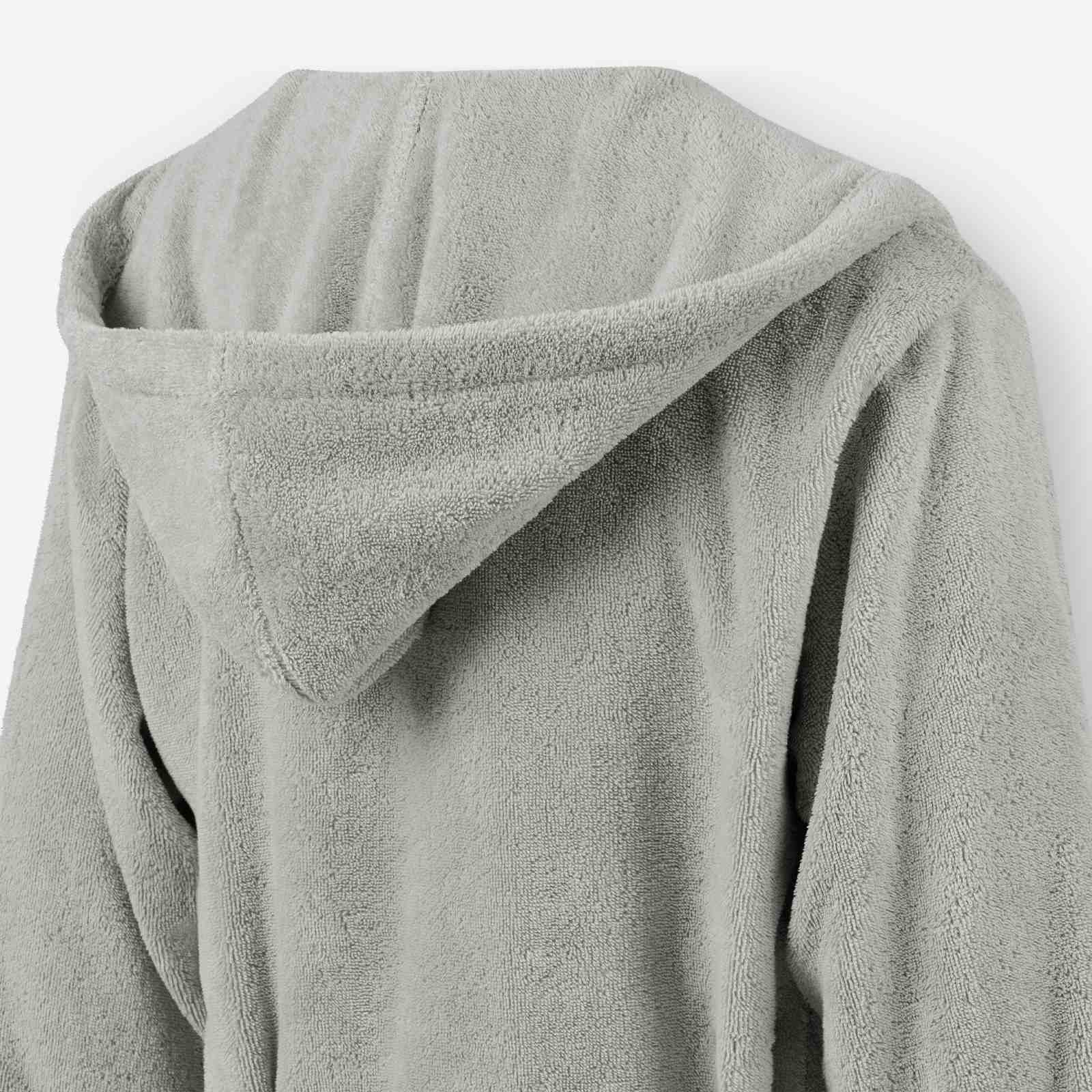 Close-up of the large hood on a light gray terry cotton bathrobe, shown from the back.