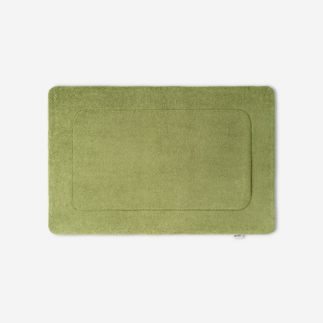 WATA VIVO Organic Cotton bath mat in mosstone green, 1300 GSM, top view, 60 x 90 cm.