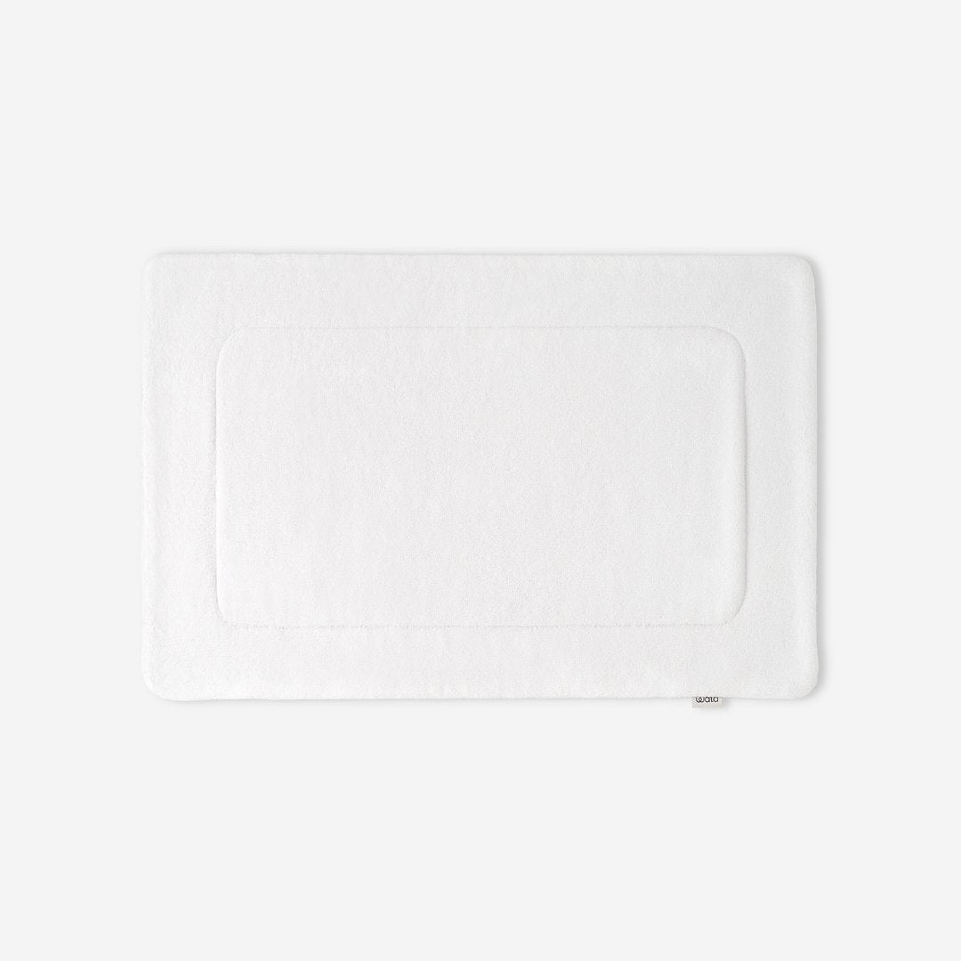 WATA VIVO Organic Cotton bath mat in white, 1300 GSM, top view, 60 x 90 cm.