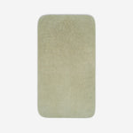 Top view of a sage green cotton towel with rounded corners, displayed flat on a white background.