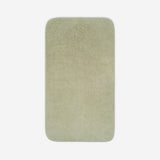 Top view of a sage green cotton towel with rounded corners, displayed flat on a white background.