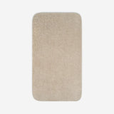 Top view of a beige organic cotton bath sheet with rounded corners, displayed flat on a white background.