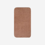 Top view of a dusty rose cotton bath towel with rounded corners, displayed flat on a white background.