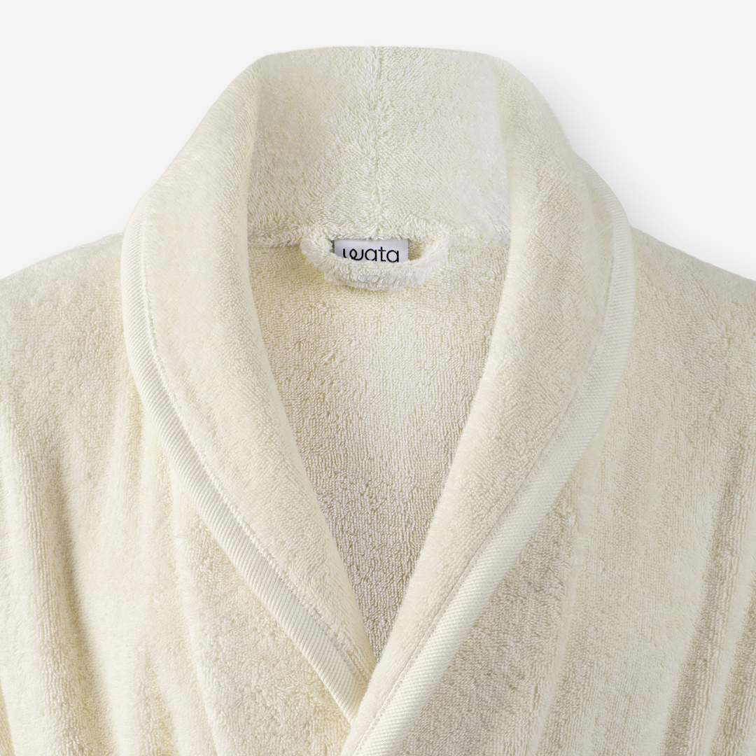 Shawl collar detail of WATA VIVO Organic Cotton bathrobe in ivory.