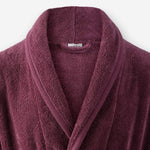 Shawl collar detail of WATA VIVO organic cotton bathrobe in purple.