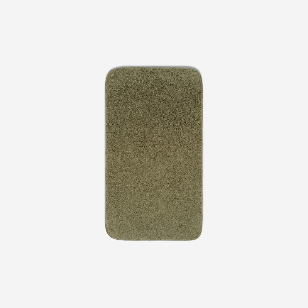 Top view of a dar olive organic cotton face towel laid flat with rounded corners, shown on a white background.