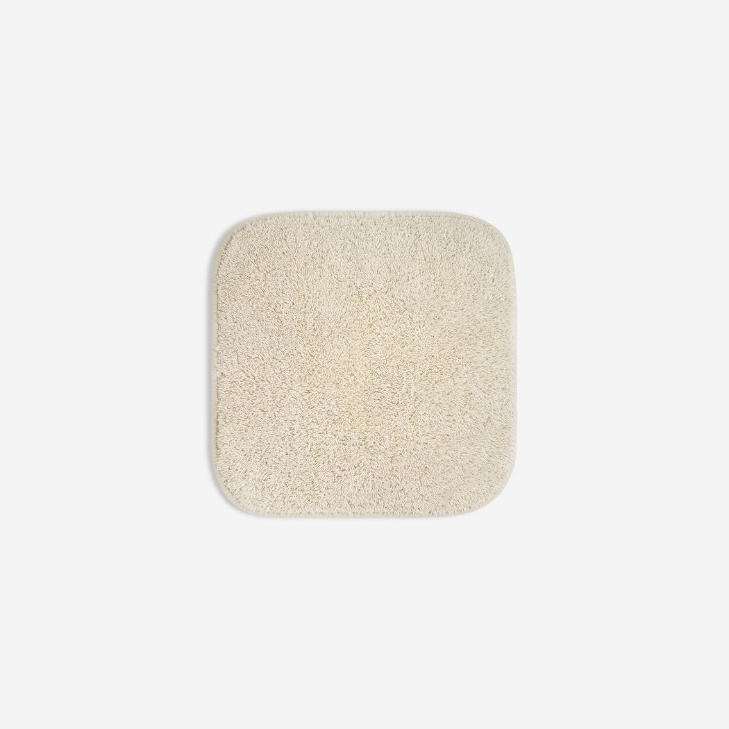 Light cream organic cotton washcloth.
