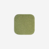 Green organic cotton washcloth.