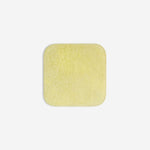 Yellow organic cotton washcloth.