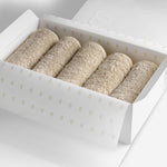 Beige organic cotton washcloth set.